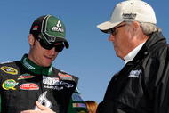 TALLADEGA, AL - NOVEMBER 01: Dale Earnhardt Jr. (L), driver of the #88 AMP Energy Get on the 88/National Guard Chevrolet, talks with team owner Rick Hendrick prior to the NASCAR Sprint Cup Series AMP Energy 500 at Talladega Superspeedway on November 1, 2009 in Talladega, Alabama. (Photo by Rusty Jarrett/Getty Images for NASCAR)