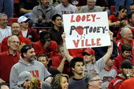 LAS VEGAS - NOVEMBER 28:  A UNLV fan holds up a sign during the team's game against the Louisville Cardinals at the Thomas & Mack Center November 28, 2009 in Las Vegas, Nevada. The Rebels defeated the Cardinals 76-71.  (Photo by Ethan Miller/Getty Images)