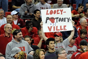 LAS VEGAS - NOVEMBER 28:  A UNLV fan holds up a sign during the team's game against the Louisville Cardinals at the Thomas & Mack Center November 28, 2009 in Las Vegas, Nevada. The Rebels defeated the Cardinals 76-71.  (Photo by Ethan Miller/Getty Images)