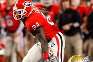 ATLANTA - NOVEMBER 28: Washaun Ealey #24 of the Georgia Bulldogs breaks a tackle by Brad Jefferson #51 of the Georgia Tech Yellow Jackets at Bobby Dodd Stadium on November 28, 2009 in Atlanta, Georgia. (Photo by Kevin C. Cox/Getty Images)