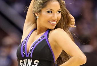 PHOENIX - NOVEMBER 25:  A Phoenix Suns cheerleader performes during the NBA game against  the Memphis Grizzlies at US Airways Center on November 25, 2009 in Phoenix, Arizona. The Suns defeated the Grizzlies 126-111.  NOTE TO USER: User expressly acknowledges and agrees that, by downloading and or using this photograph, User is consenting to the terms and conditions of the Getty Images License Agreement.  (Photo by Christian Petersen/Getty Images)
