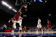 PORTLAND, OR - MARCH 19: Sergio Kerusch #1 of the Western Kentucky Hilltoppers dunks the ball over Dominique Keller #23 of the Illinois Fighting Illini in the second half during the first round of the NCAA Division I Men's Basketball Tournament at the Rose Garden on March 19, 2009 in Portland, Oregon. (Photo by Jonathan Ferrey/Getty Images)