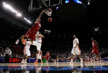 PORTLAND, OR - MARCH 19:  Sergio Kerusch #1 of the Western Kentucky Hilltoppers dunks the ball over Dominique Keller #23 of the Illinois Fighting Illini in the second half during the first round of the NCAA Division I Men's Basketball Tournament at the Rose Garden on March 19, 2009 in Portland, Oregon.  (Photo by Jonathan Ferrey/Getty Images)