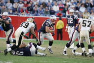 FOXBOROUGH, MA - NOVEMBER 20:  Fullback Heath Evans #44 of the New England Patriots carries the ball against linebacker Ronald McKinnon #59 of the New Orleans Saints at Gillette Stadium on November 20, 2005 in Foxborough, Massachusetts.The Patriots defeated the Saints 24-17. (Photo by Jim McIsaac/Getty Images)    