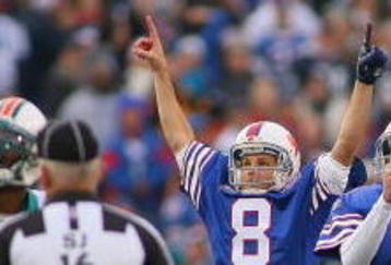 ORCHARD PARK, NY - NOVEMBER 29:  Brian Moorman #8 and Rian Lindell #9  of the Buffalo Bills react to Lindell's successful 56 yard field goal against the Miami Dolphins at Ralph Wilson Stadium on November 29, 2009 in Orchard Park, New York. Buffalo won 31-14. (Photo by Rick Stewart/Getty Images)