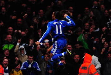 LONDON, ENGLAND - NOVEMBER 29:  Didier Drogba of Chelsea celebrates scoring his second goal during the Barclays Premier League match between Arsenal and Chelsea at the Emirates Stadium on November 29, 2009 in London, England.  (Photo by Mike Hewitt/Getty Images)