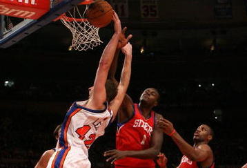 NEW YORK - OCTOBER 31: David Lee #42 of the New York Knicks blocks the shot of Samuel Dalembert #1 of the Philadelphia 76ers at Madison Square Garden on October 31, 2009 in New York, New York. NOTE TO USER: User expressly acknowledges and agrees that, by downloading and or using this photograph, User is consenting to the terms and conditions of the Getty Images License Agreement. (Photo by Chris Trotman/Getty Images)