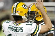 DETROIT , MI - NOVEMBER 26: Donald Lee #86 of the Green Bay Packers celebrates a first second quarter touchdown with Aaron Rodgers #12 while playing the Detroit Lions on November 26, 2009 at Ford Field in Detroit, Michigan.  (Photo by Gregory Shamus/Getty Images)