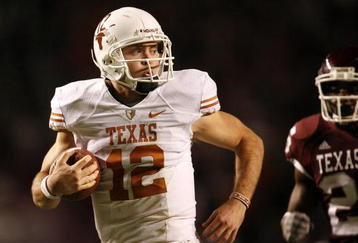 COLLEGE STATION, TX - NOVEMBER 26: Quarterback Colt McCoy #12 of the Texas Longhorns looks back as he scrambles away from the Texas A&M Aggies to score a touchdown in the first half at Kyle Field on November 26, 2009 in College Station, Texas.  (Photo by Aaron M. Sprecher/Getty Images)