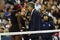 NEW YORK - SEPTEMBER 12:  Serena Williams (L) argues with Brian Early (R) and Donna Kelso (C) after disqualified for a default during the Women's Singles Semifinal match against to Kim Clijsters of Belgium on day thirteen of the 2009 U.S. Open at the USTA Billie Jean King National Tennis Center on September 12, 2009 in the Flushing neighborhood of the Queens borough of New York City.  (Photo by Julian Finney/Getty Images)