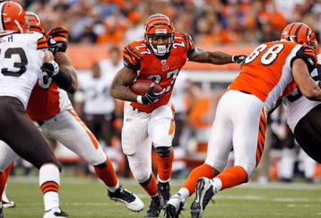 CINCINNATI - NOVEMBER 29:  Larry Johnson #27 of the Cincinnati Bengals runs with the ball  during the NFL game against the Cleveland Browns at Paul Brown Stadium on November 29, 2009 in Cincinnati, Ohio.  (Photo by Andy Lyons/Getty Images)