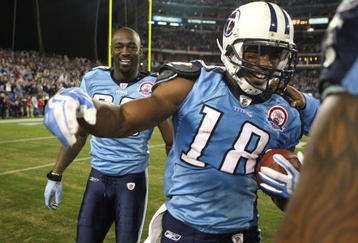 NASHVILLE, TN - NOVEMBER 29:  Kenny Britt #18 of the Tennessee Titans celebrates with teammate Jevon Kearse #90 after catching the game-winning touchdown to give the Titans a 20-17 victory over the Arizona Cardinals during their game at LP Field on November 29, 2009 in Nashville, Tennessee.  (Photo by Streeter Lecka/Getty Images)
