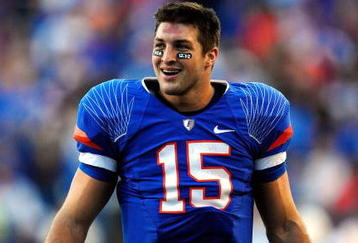 GAINESVILLE, FL - NOVEMBER 28:  Tim Tebow #15 of the Florida Gators smiles after a defensive stop during the game against the Florida State Seminoles at Ben Hill Griffin Stadium on November 28, 2009 in Gainesville, Florida.  (Photo by Sam Greenwood/Getty Images)