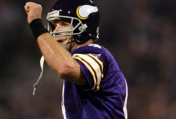 MINNEAPOLIS - NOVEMBER 29:  Brett Favre #4 of the Minnesota Vikings celebrates a touchdown in the second quarter against the Chicago Bears on November 29, 2009 at Hubert H. Humphrey Metrodome in Minneapolis, Minnesota.  (Photo by Elsa/Getty Images)