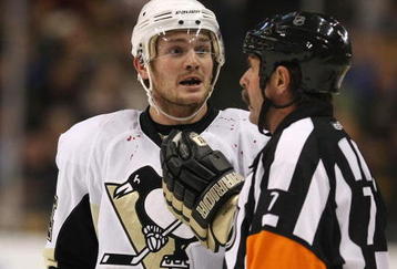 BOSTON - NOVEMBER 10:  Matt Cooke #24 of the Pittsburgh Penguins talks with referee Bill McCreary in the first period against the Boston Bruins on November 10, 2009 at the TD Garden in Boston, Massachusetts.  (Photo by Elsa/Getty Images)