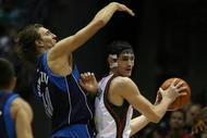 MILWAUKEE - NOVEMBER 16: Ersan Ilyasova #7 of the Milwuakee Bucks looks to pass under pressure from Dirk Nowitzki #41 of the Dallas Mavericks at the Bradley Center on November 16, 2009 in Milwaukee, Wisconsin. The Mavericks defeated the Bucks 115-113 in overtime. (Photo by Jonathan Daniel/Getty Images)