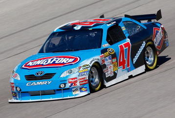FORT WORTH, TX - NOVEMBER 06:  Marcos Ambrose drives the #47 Little Debbie/Kingsford/Clorox Toyota during practice for the NASCAR Sprint Cup Series Dickies 500 at Texas Motor Speedway on November 6, 2009 in Fort Worth, Texas.  (Photo by Geoff Burke/Getty Images for NASCAR)