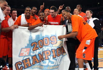 NEW YORK - NOVEMBER 20:  The Syracuse Orange celebrate after defeating the North Carolina Tar Heels to win the championship game of the 2K Sports Classic on November 20, 2009 at Madison Square Garden in New York City. The Orange defeated the Tar Heels 87-71 to win the championship.  (Photo by Jim McIsaac/Getty Images)
