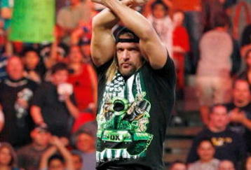 LAS VEGAS - AUGUST 24:  Wrestler Triple H gestures to the crowd during the WWE Monday Night Raw show at the Thomas & Mack Center August 24, 2009 in Las Vegas, Nevada.  (Photo by Ethan Miller/Getty Images)