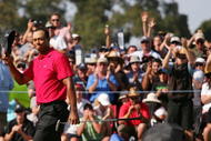 MELBOURNE, AUSTRALIA - NOVEMBER 15:  Tiger Woods of the USA is applauded after victory on the 18th hole during the final round of the 2009 Australian Masters at Kingston Heath Golf Club on November 15, 2009 in Melbourne, Australia.  (Photo by Scott Barbour/Getty Images)