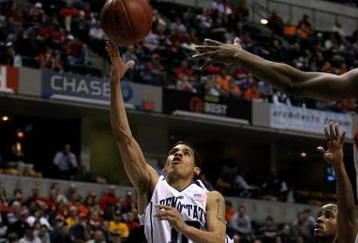 INDIANAPOLIS - MARCH 13:  Talor Battle #12 of the Penn State Nittany Lions drives for a shot attempt against the Illinois Fighting Illini during the Big Ten Men's Basketball Tournament at Conseco Fieldhouse on March 13, 2008 in Indianapolis, Indiana. Illionis won 64-63. (Photo by Jonathan Daniel/Getty Images)