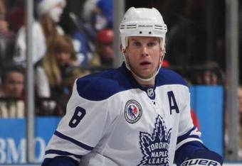 TORONTO, ON - NOVEMBER 07:  Michael Komisarek #8 of the Toronto Maple Leafs skates against the Detroit Red Wings at the Air Canada Centre on November 7, 2009 in Toronto, Canada.  (Photo by Bruce Bennett/Getty Images)