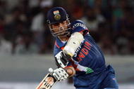 HYDERABAD, INDIA - NOVEMBER 05:  Sachin Tendulkar of India hits out during the fifth One Day International match between India and Australia at Rajiv Gandhi International Cricket Stadium on November 5, 2009 in Hyderabad, India.  (Photo by Mark Kolbe/Getty Images)