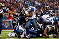 ST. LOUIS - NOVEMBER 29:  Justin Forsett #20 of the Seattle Seahawks scores a touchdown against the St. Louis Rams at the Edward Jones Dome on November 29, 2009 in St. Louis, Missouri.  The Seahawks beat the Rams 27-17.  (Photo by Dilip Vishwanat/Getty Images)