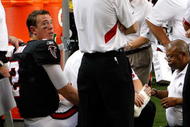 ATLANTA - NOVEMBER 29:  Quarterback Matt Ryan #2 of the Atlanta Falcons has his right foot attended to during the first half against the Tampa Bay Buccaneers at Georgia Dome on November 29, 2009 in Atlanta, Georgia.  (Photo by Kevin C. Cox/Getty Images)