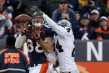 DENVER - NOVEMBER 23:  Tight end Tony Scheffler #88 of the Denver Broncos is unable to make a reception as Michael Huff #24 of the Oakland Raiders defends during week 12 NFL action at Invesco Field at Mile High on November 23, 2008 in Denver, Colorado. The Raiders defeated the Broncos 31-10.  (Photo by Doug Pensinger/Getty Images)