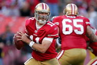 SAN FRANCISCO - NOVEMBER 29: Alex Smith #11 of the San Francisco 49ers drops back to pass during their game against the Jacksonville Jaguars at Candlestick Park on November 29, 2009 in San Francisco, California.  (Photo by Ezra Shaw/Getty Images)