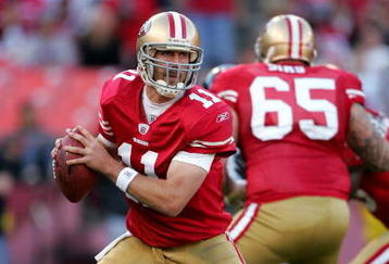 SAN FRANCISCO - NOVEMBER 29: Alex Smith #11 of the San Francisco 49ers drops back to pass during their game against the Jacksonville Jaguars at Candlestick Park on November 29, 2009 in San Francisco, California.  (Photo by Ezra Shaw/Getty Images)