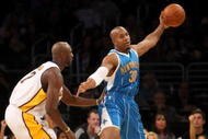 LOS ANGELES, CA - NOVEMBER 08: David West #30 of the New Orleans Hornets controls the ball against Lamar Odom #7 of the Los Angeles Lakers on November 8, 2009 at Staples Center in Los Angeles, California. The Lakers won 104-88. NOTE TO USER: User expressly acknowledges and agrees that, by downloading and/or using this Photograph, user is consenting to the terms and conditions of the Getty Images License Agreement. (Photo by Stephen Dunn/Getty Images)