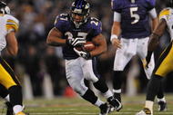 BALTIMORE - NOVEMBER 29: Ray Rice #27 of the Baltimore Ravens runs the ball towards the center of the hashmarks in overtime to help set up the winning kick against the Pittsburgh Steelers at M&T Bank Stadium on November 29, 2009 in Baltimore, Maryland. The Ravens defeated the Steelers 20-17. (Photo by Larry French/Getty Images)
