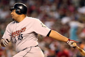PHOENIX - AUGUST 30:  Carlos Lee #45 of the Houston Astros bats against the Arizona Diamondbacks during the major league baseball game at Chase Field on August 30, 2009 in Phoenix, Arizona. The Diamondbacks defeated the Astros 4-3.  (Photo by Christian Petersen/Getty Images)