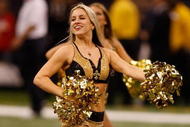 NEW ORLEANS - NOVEMBER 02:  New Orleans Saintsations cheerleaders dance during the game between the New Orleans Saints and the Atlanta Falcons at Louisana Superdome on November 2, 2009 in New Orleans, Louisiana.  (Photo by Chris Graythen/Getty Images)