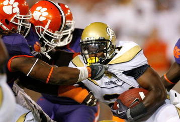 ATLANTA - SEPTEMBER 10:  Da'Quan Bowers #93 and Brandon Thompson #98 of the Clemson Tigers tackle Jonathan Dwyer #21 of the Georgia Tech Yellow Jackets at Bobby Dodd Stadium on September 10, 2009 in Atlanta, Georgia.  (Photo by Kevin C. Cox/Getty Images)