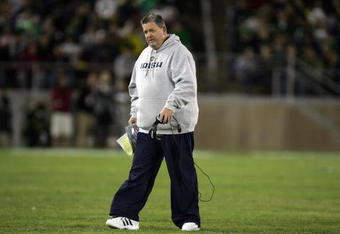 PALO ALTO, CA - NOVEMBER 28:  Notre Dame head coach Charlie Weis walks back to the sideline after speaking to his team during their game against the Stanford Cardinal at Stanford Stadium on November 28, 2009 in Palo Alto, California.  (Photo by Ezra Shaw/Getty Images)