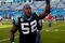 CHARLOTTE, NC - NOVEMBER 15:  Jon Beason #52 of the Carolina Panthers celebrates a 28-19 against the Atlanta Falcons during their game at Bank of America Stadium on November 15, 2009 in Charlotte, North Carolina.  (Photo by Streeter Lecka/Getty Images)