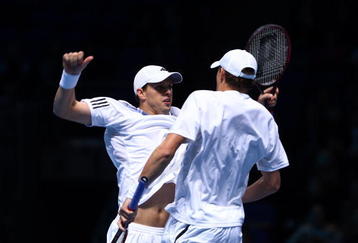 LONDON, ENGLAND - NOVEMBER 28: Bob Bryan of USA celebrates with Mike Bryan of USA after they won the men's semi final match against Mahesh Bhupathi of India and Mark Knowles of The Bahamas during the Barclays ATP World Tour Finals at the O2 Arena on November 28, 2009 in London, England.  (Photo by Julian Finney/Getty Images)