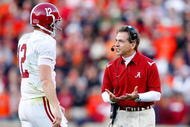 AUBURN, AL - NOVEMBER 27: Head coach Nick Saban of the Alabama Crimson Tide converses with quarterback Greg McElroy #12 during the game against the Auburn Tigers at Jordan-Hare Stadium on November 27, 2009 in Auburn, Alabama. (Photo by Kevin C. Cox/Getty Images)