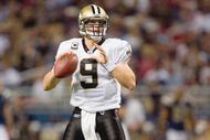 ST. LOUIS - NOVEMBER 15:  Quarterback Drew Brees #9 of the New Orleans Saints looks to pass the ball during the game against the St. Louis Rams at the Edward Jones Dome on November 15, 2009 in St. Louis, Missouri.  (Photo by Dilip Vishwanat/Getty Images)