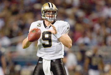 ST. LOUIS - NOVEMBER 15:  Quarterback Drew Brees #9 of the New Orleans Saints looks to pass the ball during the game against the St. Louis Rams at the Edward Jones Dome on November 15, 2009 in St. Louis, Missouri.  (Photo by Dilip Vishwanat/Getty Images)