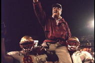 1 Jan 1996: Head coach Bobby Bowden of the Florida State Seminoles is carried triumphantly off the field by nose guard Andre Wadsworth #8 and tackle Orpheus Roy after defeating the Notre Dame Fighting Irish in the Orange Bowl in Miami, Florida 31-26. Ma