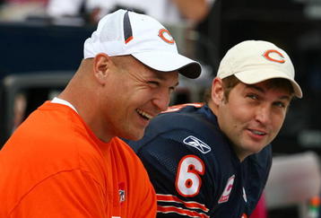 CHICAGO - OCTOBER 04: Injured linebacker Brian Urlacher of the Chicago Bears shares a laugh with Jay Cutler #6 on the bench during a game against the Detroit Lions on October 4, 2009 at Soldier Field in Chicago, Illinois. The Bears defeated the Lions 48-24.  (Photo by Jonathan Daniel/Getty Images)