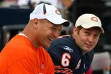 CHICAGO - OCTOBER 04: Injured linebacker Brian Urlacher of the Chicago Bears shares a laugh with Jay Cutler #6 on the bench during a game against the Detroit Lions on October 4, 2009 at Soldier Field in Chicago, Illinois. The Bears defeated the Lions 48-24.  (Photo by Jonathan Daniel/Getty Images)