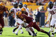 TEMPE, AZ - NOVEMBER 28:  Wide receiver William Wright #19 of the Arizona Wildcats is tackled by Matthew Tucker #12 of the Arizona State Sun Devils after a reception during the college football game at Sun Devil Stadium on November 28, 2009 in Tempe, Arizona. The Wildcats defeated the Sun Devils 20-17.  (Photo by Christian Petersen/Getty Images)
