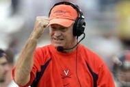 ATLANTA - NOVEMBER 20:  Head coach Al Groh shows his excitement after Alvin Pearman of the Virginia Cavaliers went 36 yards for a first down against the Georgia Tech Yellow Jackets as the Cavs defeated the Yellow Jackets 30-10 during NCAA football action at Bobby Dodd Stadium on November 20, 2004 in Atlanta, Georgia. (Photo by Doug Pensinger/Getty Images)