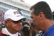 TALLAHASSEE, FL - NOVEMBER 25:  Head coach Bobby Bowden of the Florida State Seminoles congratulates head coach Urban Meyer of the Florida Gators after the Gators' victory at Doak Campbell Stadium November 25, 2006 in Tallahassee, Florida. Florida defeated Florida State 21-14.  (Photo by Doug Benc/Getty Images)