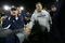 PALO ALTO, CA - NOVEMBER 28:  Notre Dame head coach Charlie Weis shakes hands with fans as he walks off the field after their loss to the Stanford Cardinal at Stanford Stadium on November 28, 2009 in Palo Alto, California.  (Photo by Ezra Shaw/Getty Images)